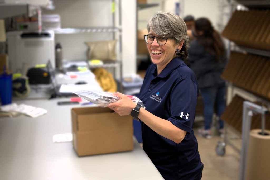 Tarrytown Pharmacy Worker Shipping Medication